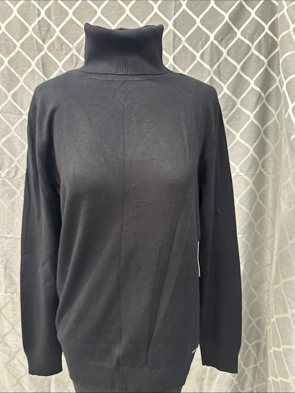 Calvin Klein Black knit turtleneck with Branded gold Tag